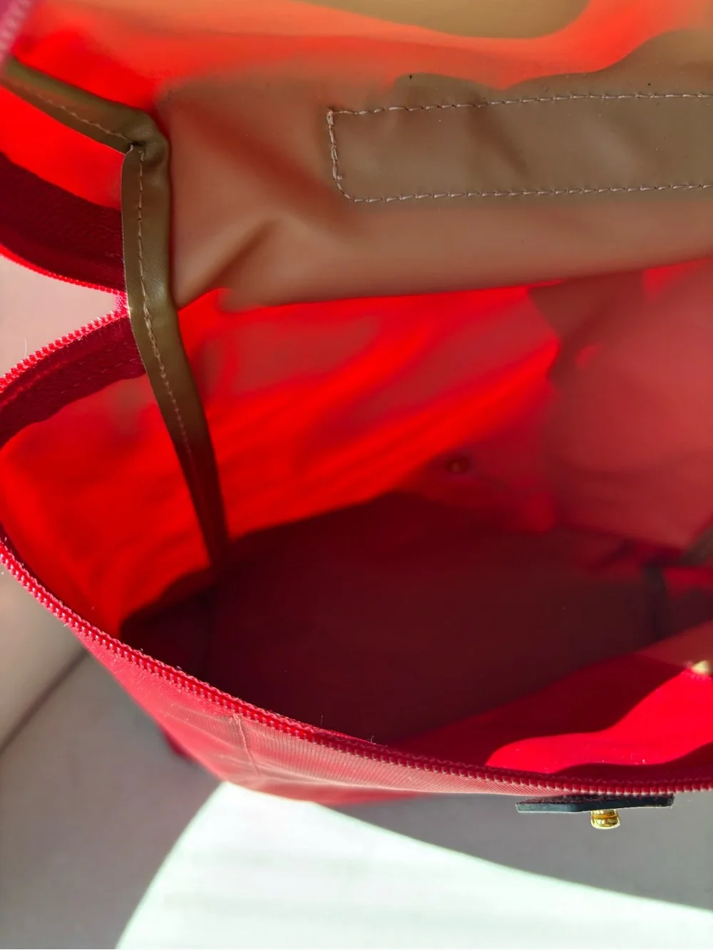 Longchamp Le Pliage Red Women's Nylon Backpack with Brown Leather Flap